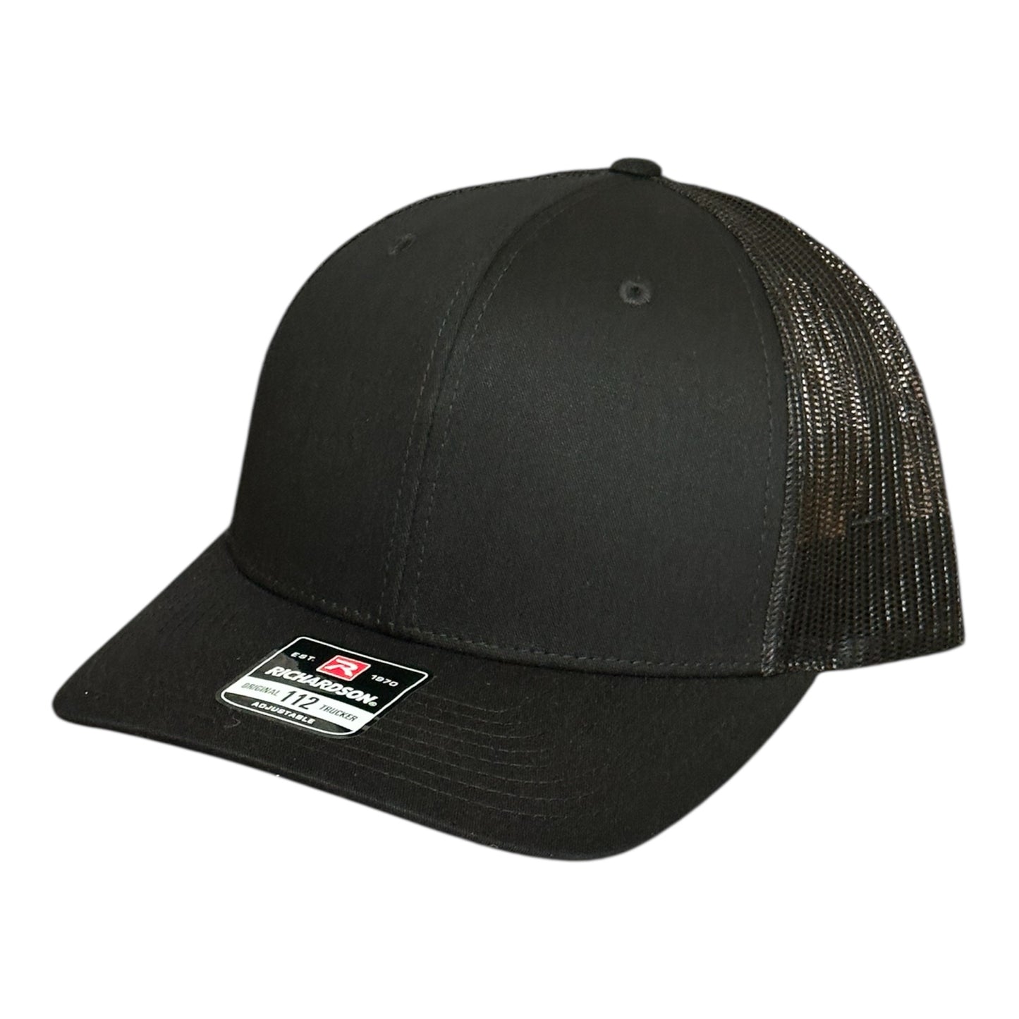 Black trucker cap with mesh back a brand logo label on a white background