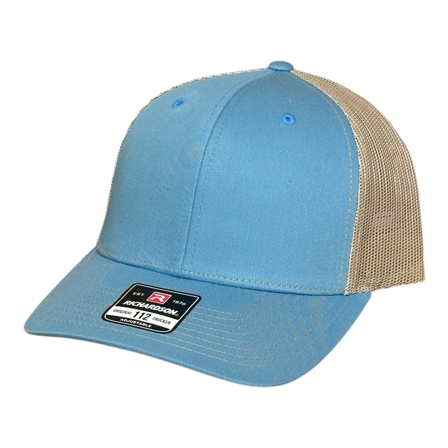 Blue trucker cap with beige mesh back and a visible brand logo label on a white background