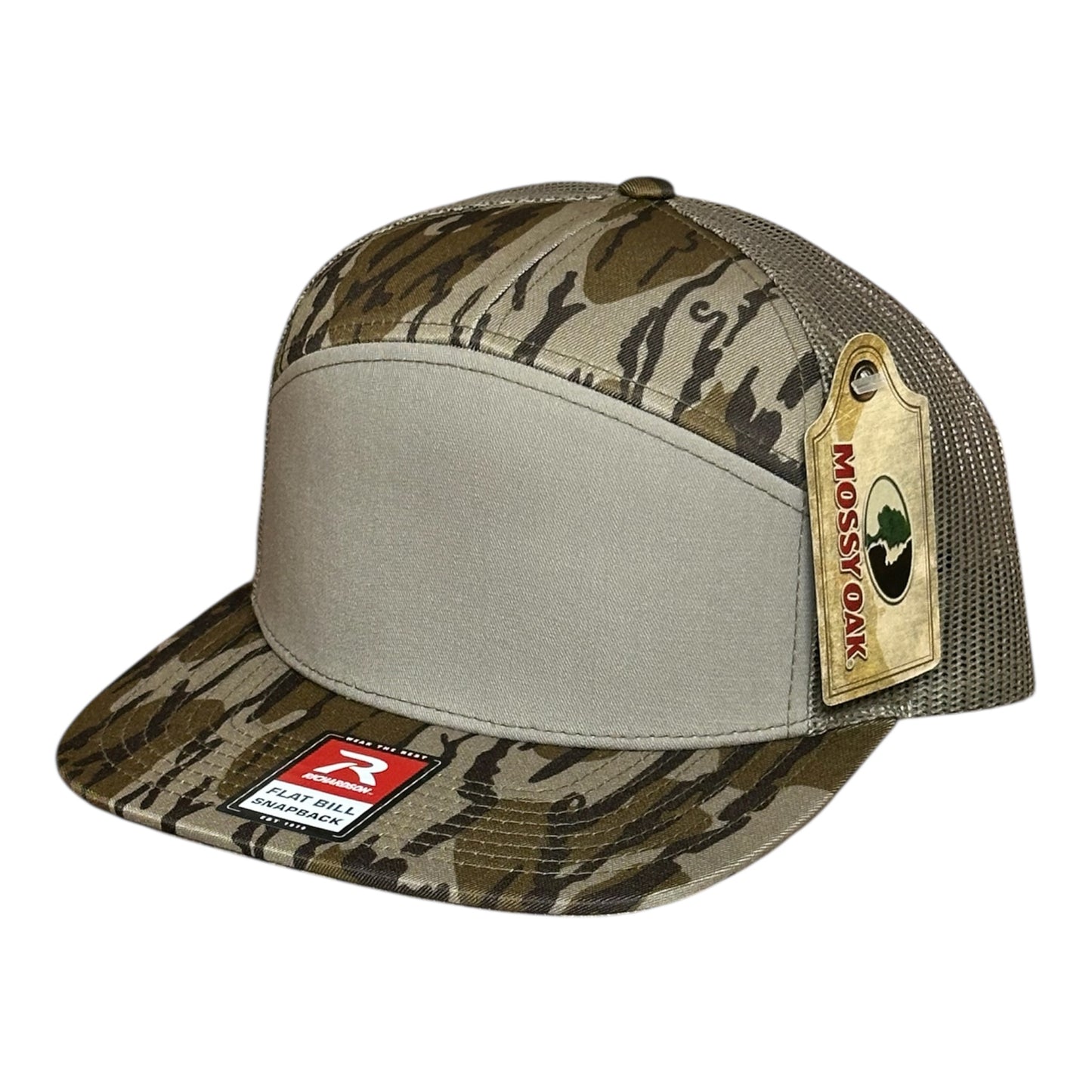 Bottomland camouflage pattern cap with mesh back and visible brand logos label on a white background