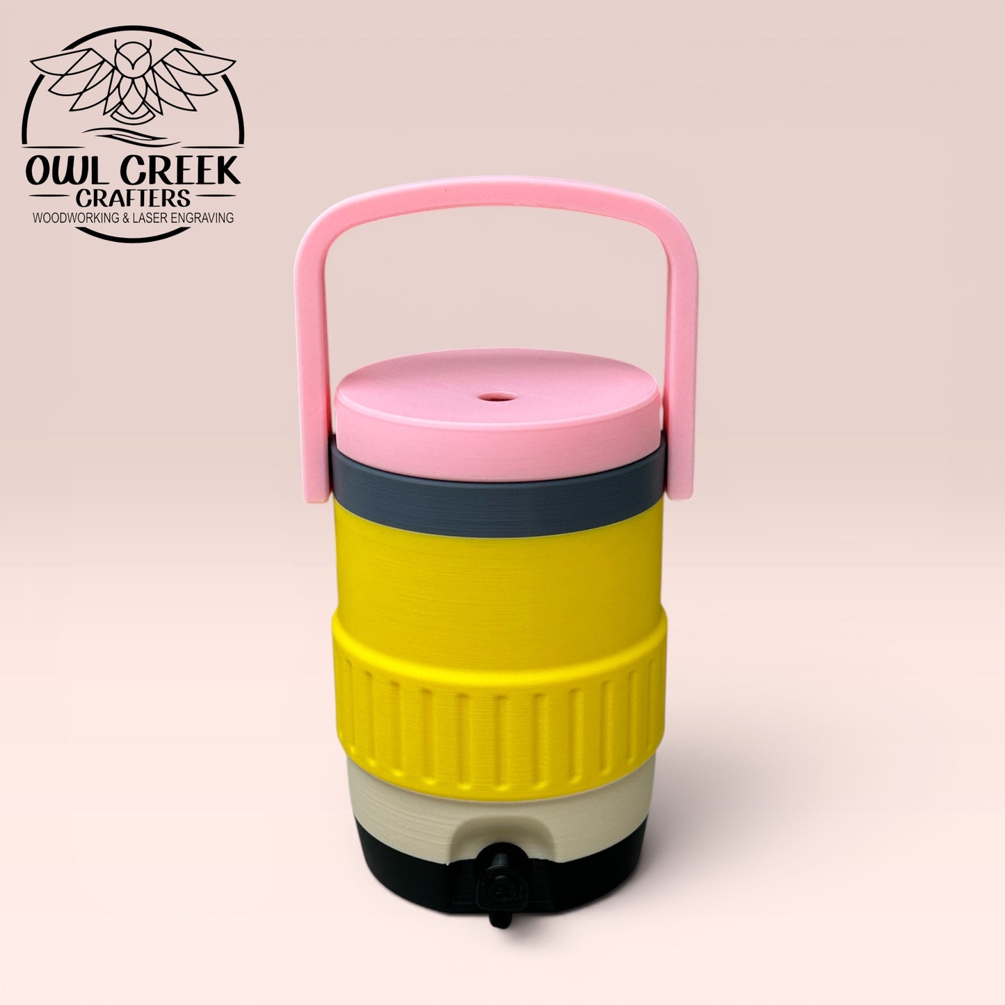 Pencil colored can cooler coozie with a beige background and the Owl Creek Crafers Logo