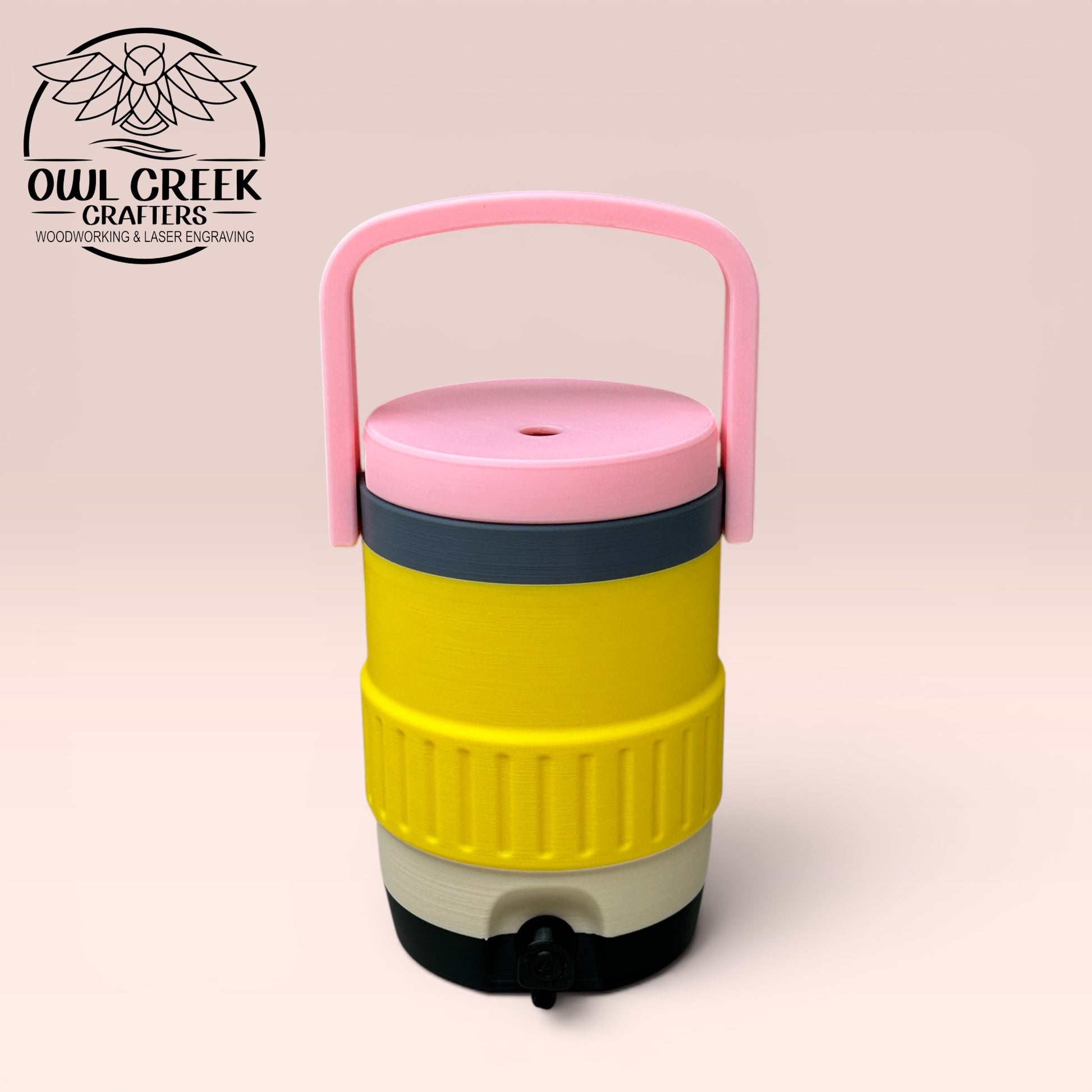 Pencil colored can cooler coozie with a beige background and the Owl Creek Crafers Logo